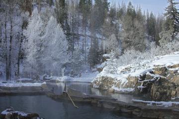 a large waterfall in a forest